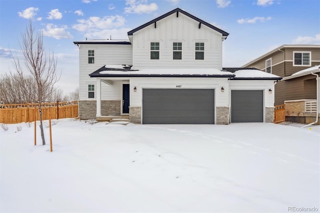 view of front of property featuring a garage