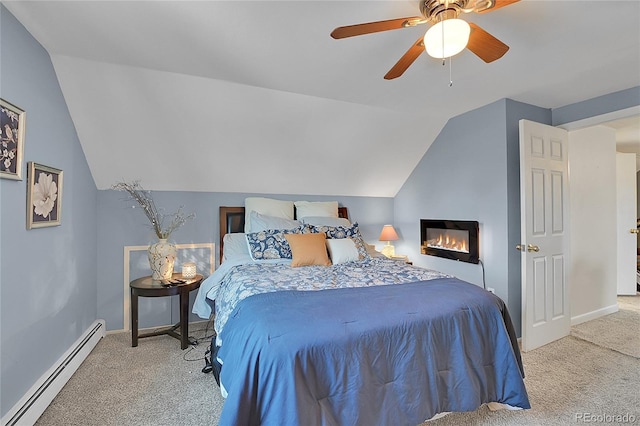 carpeted bedroom featuring baseboard heating, lofted ceiling, and ceiling fan