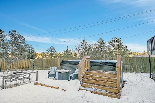 exterior space with a hot tub