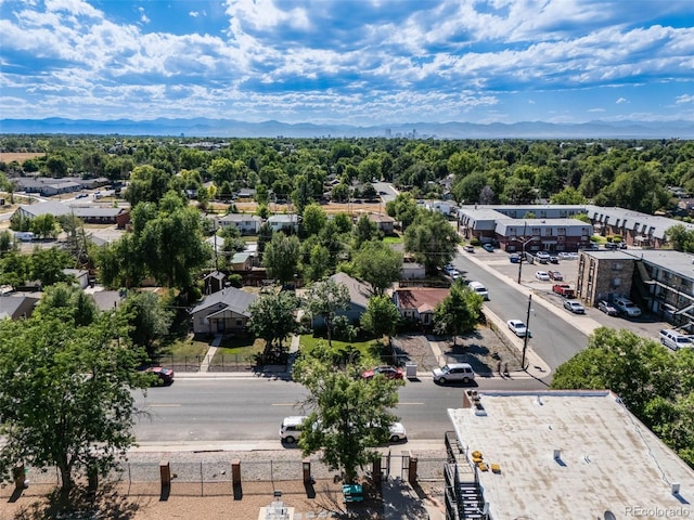 birds eye view of property with a mountain view