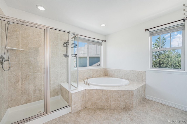 26004 E Elmhurst Pl, Aurora, CO 80016 - bathroom with a garden tub, a shower stall, tile patterned flooring, recessed lighting, and baseboards