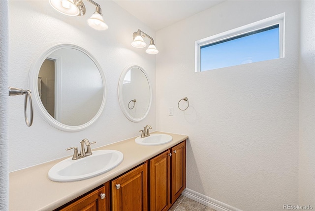 26004 E Elmhurst Pl, Aurora, CO 80016 - full bath featuring double vanity and tile patterned flooring