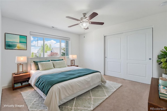 26004 E Elmhurst Pl, Aurora, CO 80016 - bedroom featuring light colored carpet, a closet, a ceiling fan, and baseboards