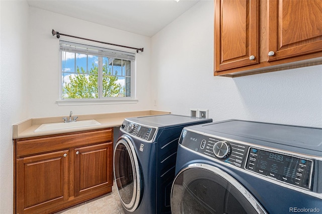 26004 E Elmhurst Pl, Aurora, CO 80016 - laundry room featuring independent washer and dryer and cabinet space
