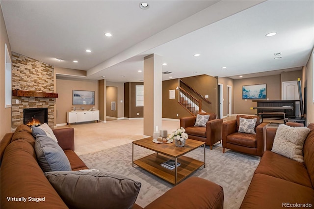 26004 E Elmhurst Pl, Aurora, CO 80016 - living room featuring light carpet, recessed lighting, stairs, a stone fireplace, and baseboards