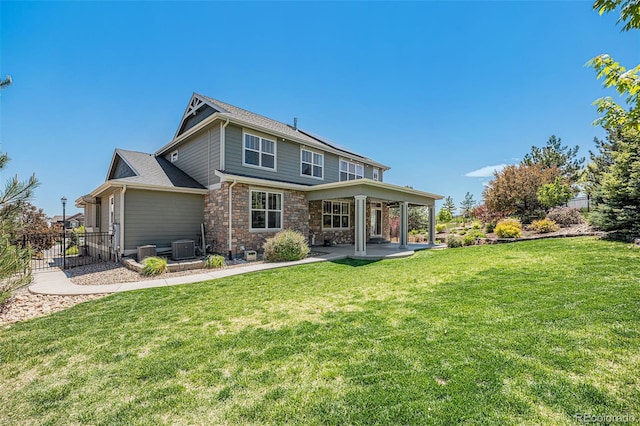 26004 E Elmhurst Pl, Aurora, CO 80016 - back of property with cooling unit