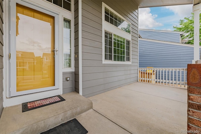 9417 Burgundy Cir, Highlands Ranch, CO 80126 - entrance to property featuring covered porch
