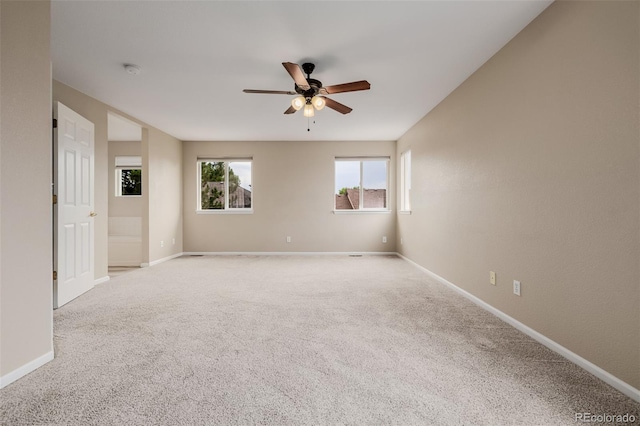 9417 Burgundy Cir, Highlands Ranch, CO 80126 - carpeted empty room featuring a ceiling fan and baseboards