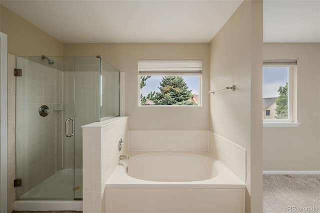 9417 Burgundy Cir, Highlands Ranch, CO 80126 - full bathroom with a garden tub and a shower stall
