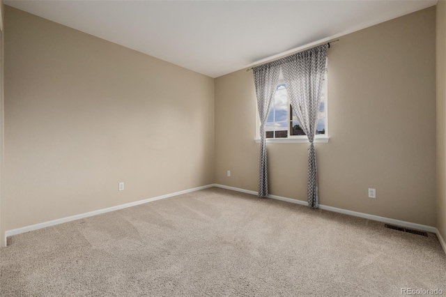 9417 Burgundy Cir, Highlands Ranch, CO 80126 - spare room featuring carpet and baseboards