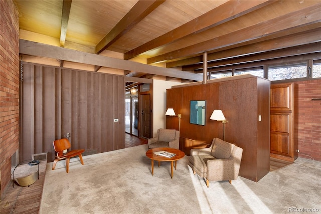 interior space featuring beamed ceiling and wood ceiling