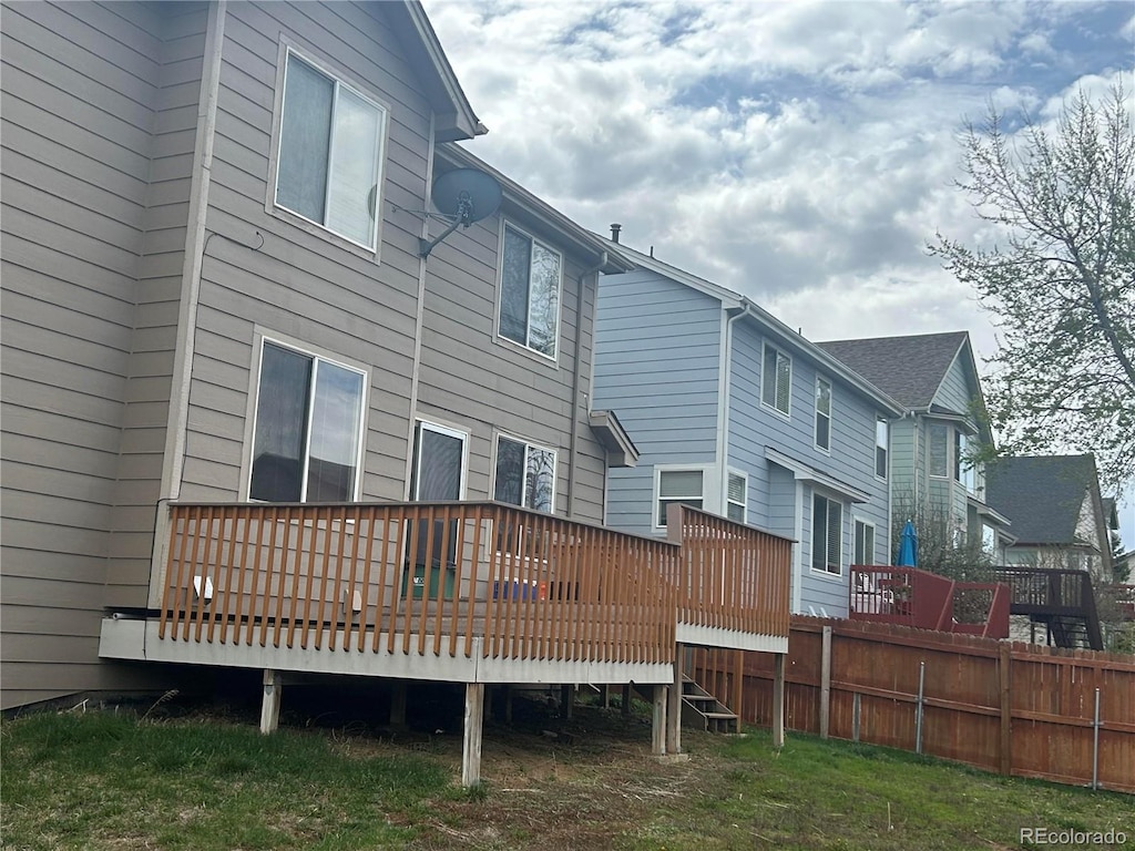 rear view of property with a deck