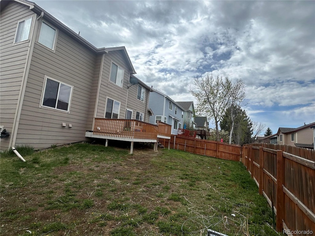 view of yard with a deck