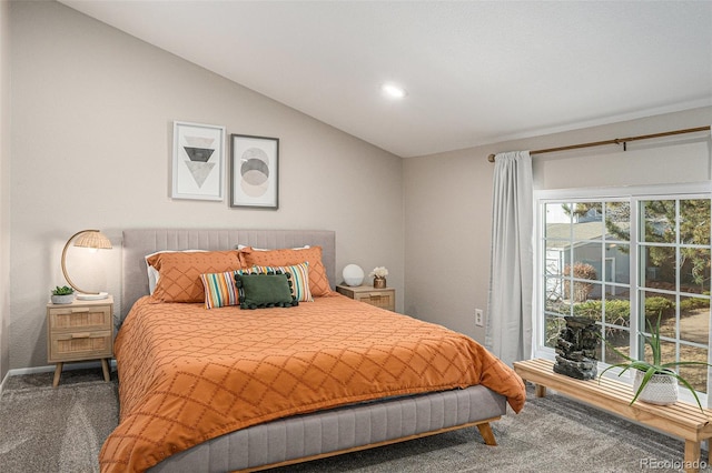 carpeted bedroom featuring vaulted ceiling