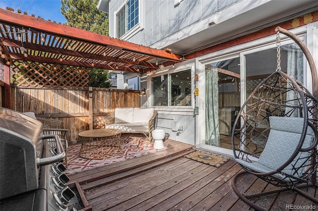 deck with fence and a pergola