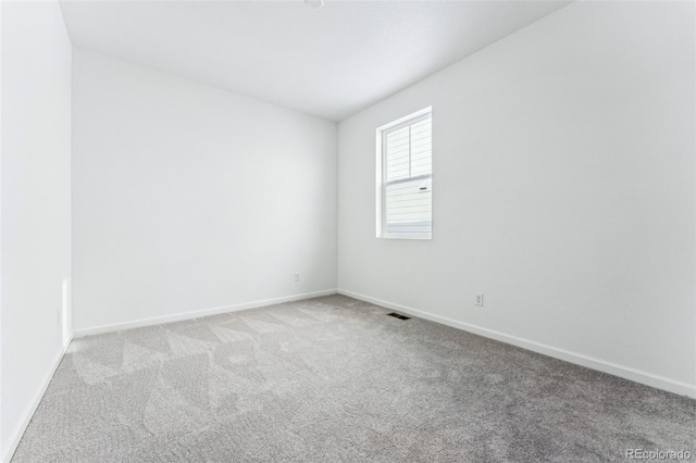 empty room with light carpet