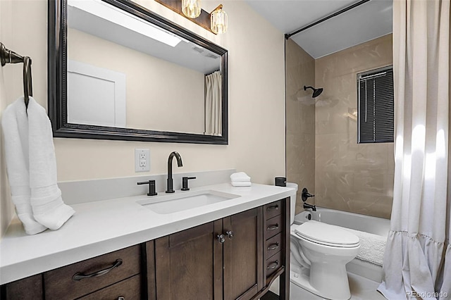 6223 W Flora Pl, Denver, CO 80227 - full bath with vanity, toilet, and shower / bathtub combination