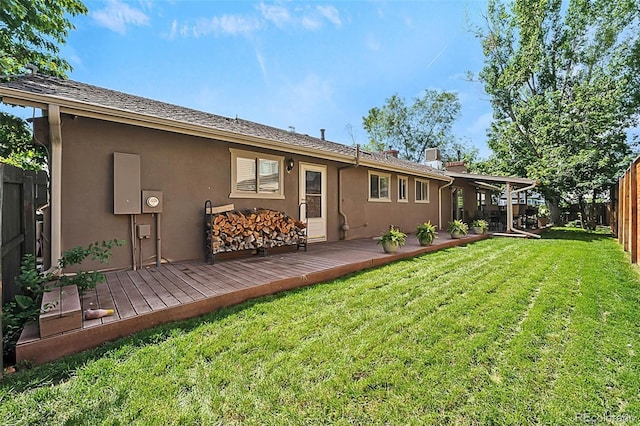 6223 W Flora Pl, Denver, CO 80227 - back of house with stucco siding and a deck