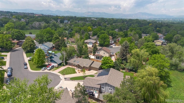 6223 W Flora Pl, Denver, CO 80227 - aerial perspective of suburban area with a mountain backdrop