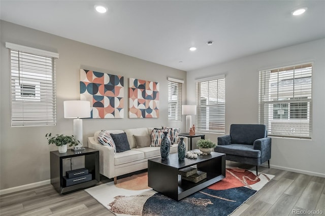 13029 E 103rd Pl, Commerce City, CO 80022 - living room featuring light wood finished floors, recessed lighting, and baseboards