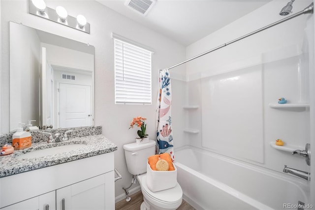13029 E 103rd Pl, Commerce City, CO 80022 - full bathroom featuring vanity, shower / bathtub combination with curtain, and toilet