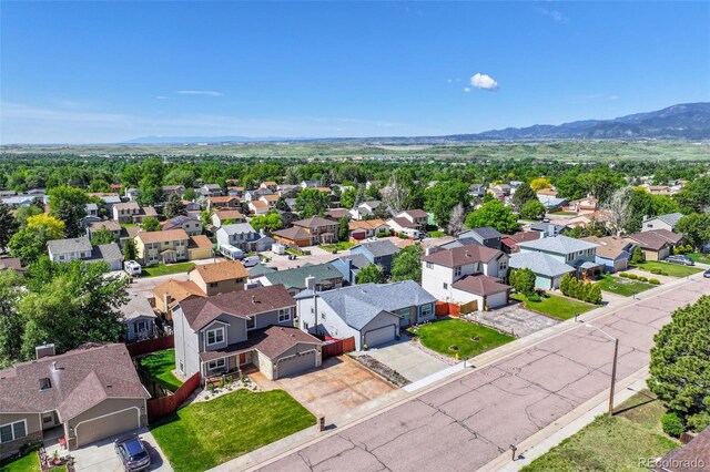 1065 Harbourne St, Colorado Springs, CO 80911 - aerial view of residential area featuring a mountainous background