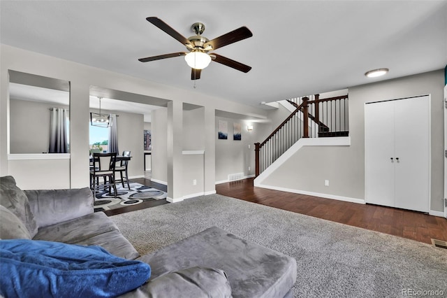 1065 Harbourne St, Colorado Springs, CO 80911 - living room featuring stairway, ceiling fan, baseboards, and carpet