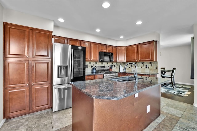 1065 Harbourne St, Colorado Springs, CO 80911 - kitchen with appliances with stainless steel finishes, a sink, tasteful backsplash, baseboards, and recessed lighting