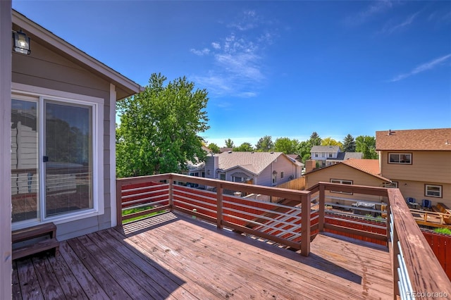 1065 Harbourne St, Colorado Springs, CO 80911 - wooden deck featuring a residential view