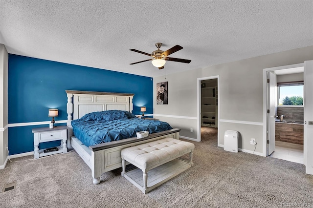 1065 Harbourne St, Colorado Springs, CO 80911 - bedroom with carpet, a textured ceiling, ceiling fan, and baseboards