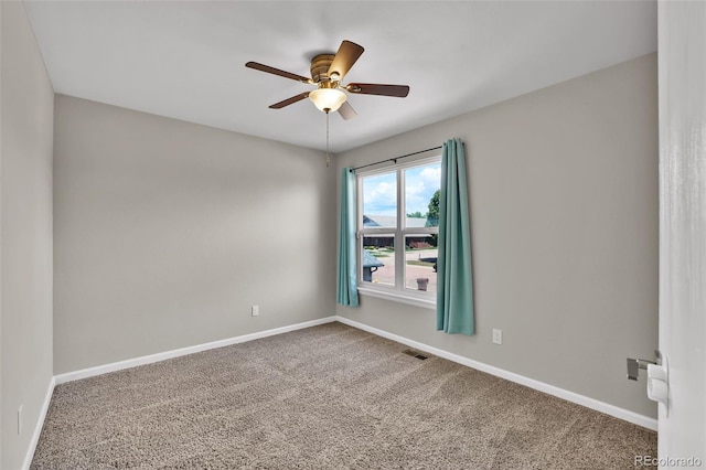 1065 Harbourne St, Colorado Springs, CO 80911 - spare room with a ceiling fan, carpet floors, and baseboards