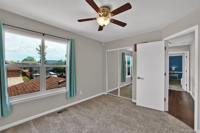 1065 Harbourne St, Colorado Springs, CO 80911 - unfurnished bedroom with baseboards, carpet floors, a closet, and ceiling fan