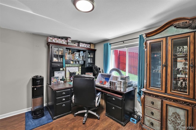1065 Harbourne St, Colorado Springs, CO 80911 - office with dark wood-style floors and baseboards