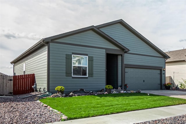 318 Thomas Ave, Keenesburg, CO 80643 - view of front of home featuring concrete driveway