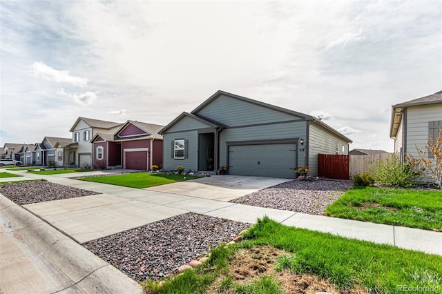 318 Thomas Ave, Keenesburg, CO 80643 - ranch-style house with fence, a garage, and driveway