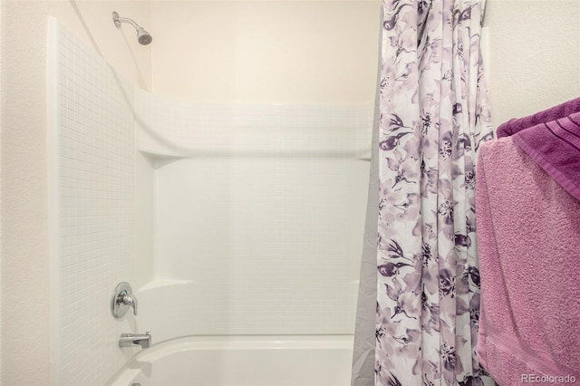 318 Thomas Ave, Keenesburg, CO 80643 - bathroom with shower / tub combo with curtain