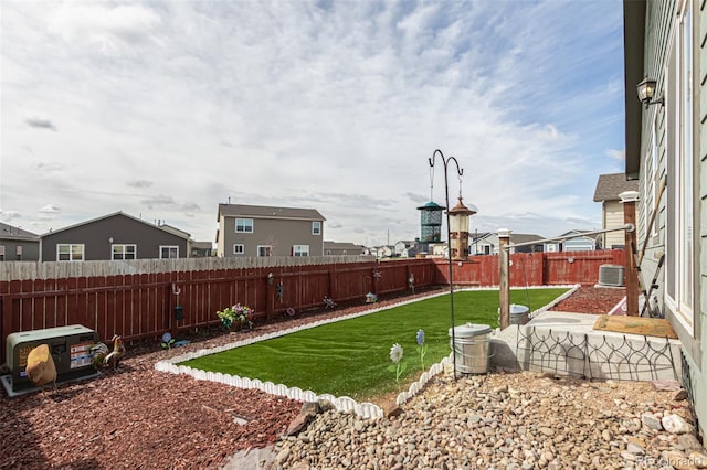 318 Thomas Ave, Keenesburg, CO 80643 - view of yard featuring a patio area and central AC unit