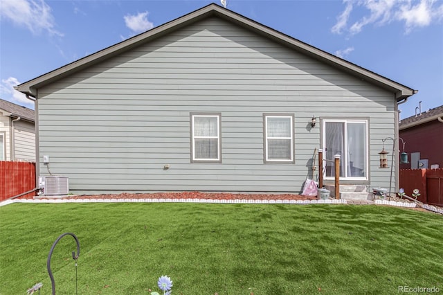 318 Thomas Ave, Keenesburg, CO 80643 - rear view of house with cooling unit