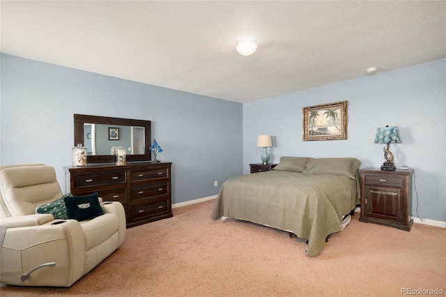 bedroom featuring light colored carpet