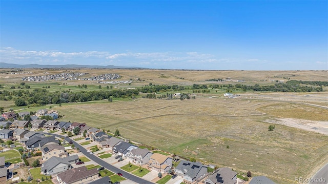 bird's eye view featuring a mountain view and a residential view