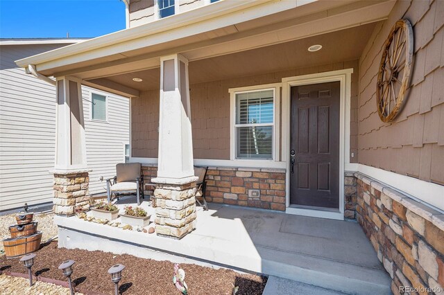 entrance to property with covered porch