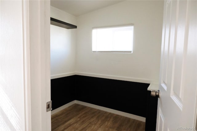 empty room with dark wood-style floors