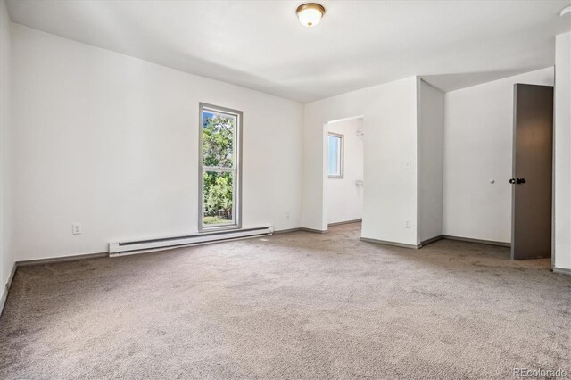 646 Maple St, Colorado Springs, CO 80903 - empty room with a baseboard heating unit and carpet