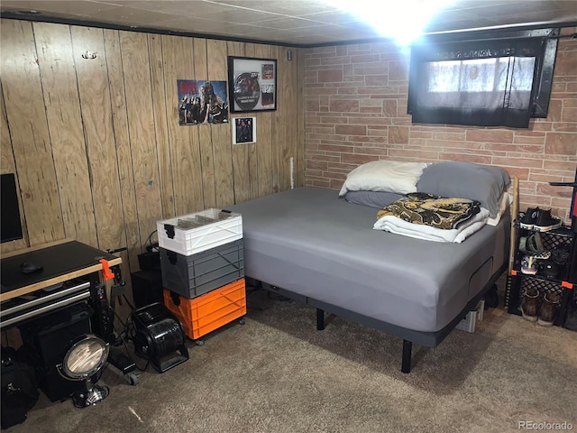 carpeted bedroom with wood walls