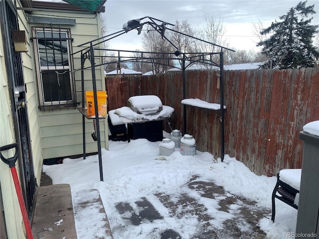 view of snow covered patio