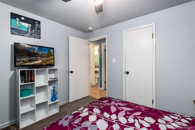 carpeted bedroom featuring a ceiling fan