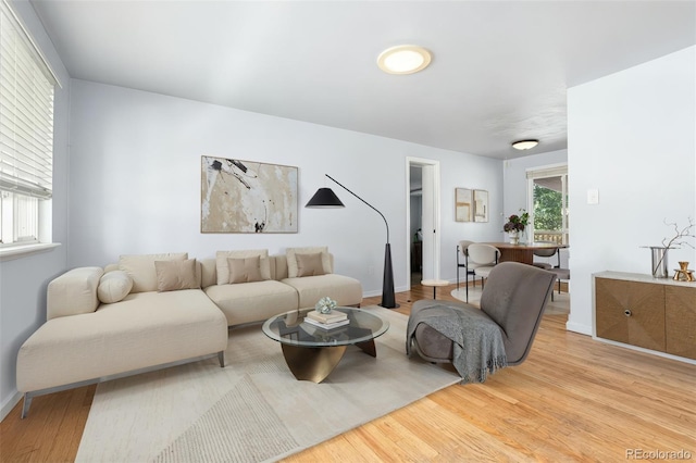 6903 W 52nd Pl, Arvada, CO 80002 - living room featuring wood finished floors and baseboards