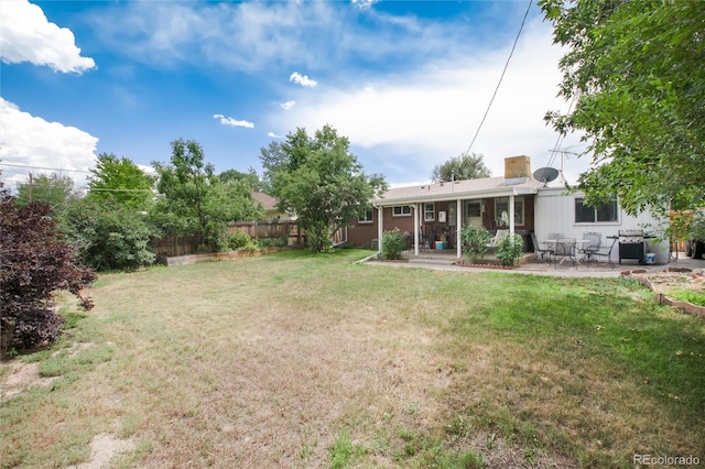 6903 W 52nd Pl, Arvada, CO 80002 - view of yard featuring a patio