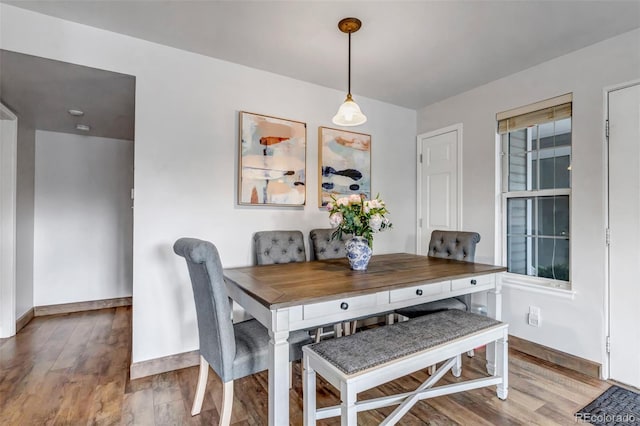 6711 S Ivy Way Unit A2, Centennial, CO 80112 - dining room featuring wood finished floors