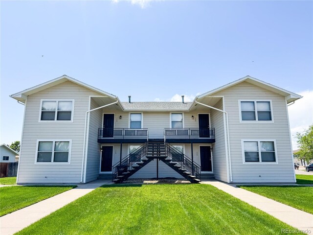 1700 S 6th Ave, Sterling, CO 80751 - multi unit property featuring stairs and a front yard